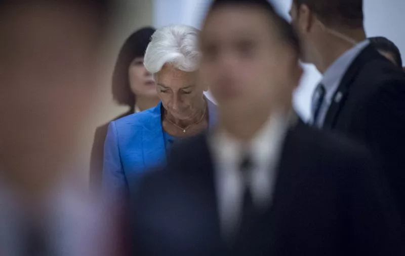 International Monetary Fund (IMF) managing-director Christine Lagarde (C) leaves the G20 finance ministers meeting in Chengdu, in China's Sichuan province on July 24, 2016.
Government representatives and central bank chiefs from the world's top 20 economies have gathered in the southwestern Chinese city of Chengdu on July 23-24 with the impact of Britain's vote to leave the European Union (EU) high on the agenda. / AFP PHOTO / FRED DUFOUR