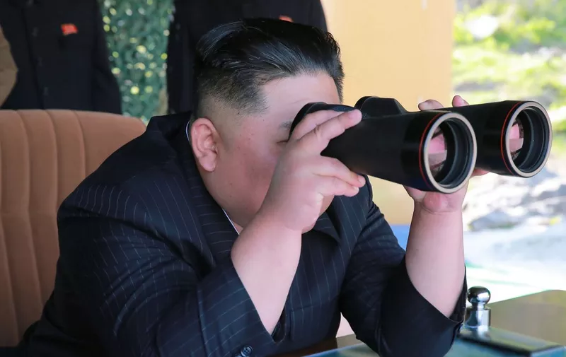 This May 9, 2019 picture released from North Korea's official Korean Central News Agency (KCNA) on May 10, 2019 shows North Korean leader Kim Jong-Un attending the strike drill of defence units of the Korean People's Army (KPA) in the forefront area and on the western front of North Korea. (Photo by KCNA VIA KNS / various sources / AFP) / South Korea OUT / ---EDITORS NOTE--- RESTRICTED TO EDITORIAL USE - MANDATORY CREDIT "AFP PHOTO/KCNA VIA KNS" - NO MARKETING NO ADVERTISING CAMPAIGNS - DISTRIBUTED AS A SERVICE TO CLIENTS / THIS PICTURE WAS MADE AVAILABLE BY A THIRD PARTY. AFP CAN NOT INDEPENDENTLY VERIFY THE AUTHENTICITY, LOCATION, DATE AND CONTENT OF THIS IMAGE --- /