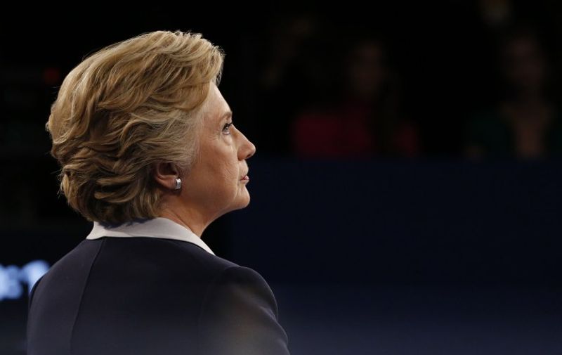 US Democratic presidential candidate Hillary Clinton looks on during the second presidential debate at Washington University in St. Louis, Missouri, on October 9, 2016. / AFP PHOTO / POOL / JIM BOURG