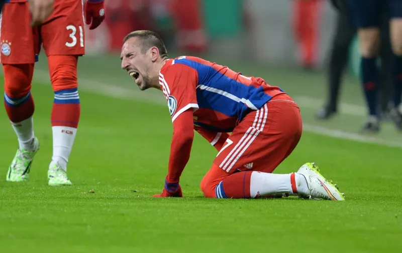 Bayern Munich's French midfielder Franck Ribery reacts during the German football Cup DFB Pokal round of 16 match between German first division football club FC Bayern Munich and German second division football club Eintracht Braunschweig in Munich southern Germany, on March 4, 2015. AFP PHOTO / CHRISTOF STACHE

+++ RESTRICTIONS / EMBARGO  ACCORDING TO DFB RULES IMAGE SEQUENCES TO SIMULATE VIDEO IS NOT ALLOWED DURING MATCH TIME. MOBILE (MMS) USE IS NOT ALLOWED DURING AND FOR FURTHER TWO HOURS AFTER THE MATCH. FOR MORE INFORMATION CONTACT DFB DIRECTLY AT +49 69 67880 / AFP / CHRISTOF STACHE