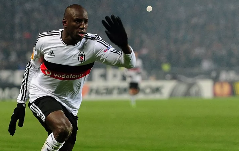 Besiktas' Senegalese forward Demba Ba reacts during the UEFA Europa League round of 16 football match between Club Brugge and Besiktas at Ataturk Olympic stadium in Istanbul on March 19, 2015. AFP PHOTO / OZAN KOSE