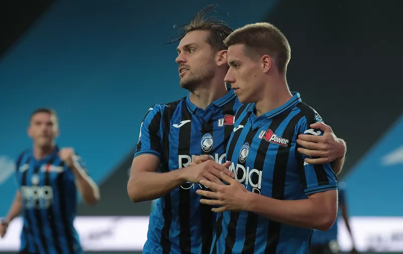 BERGAMO, ITALY - JULY 02:  Mario Pasalic of Atalanta BC celebrates with his team-mate Rafael Toloi after scoring the opening goal during the Serie A match between Atalanta BC and SSC Napoli at Gewiss Stadium on July 2, 2020 in Bergamo, Italy.  (Photo by Emilio Andreoli/Getty Images)