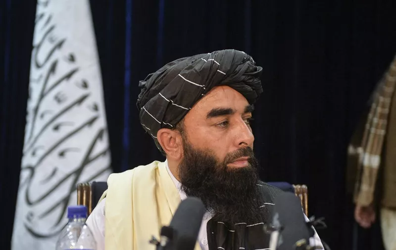 Taliban spokesperson Zabihullah Mujahid looks on as he addresses the first press conference in Kabul on August 17, 2021 following the Taliban stunning takeover of Afghanistan. (Photo by Hoshang Hashimi / AFP)