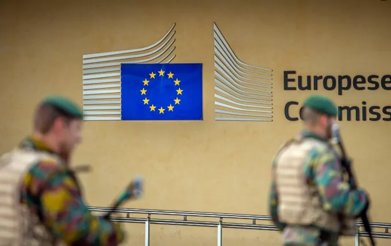 An image taken on April 24, 2015 shows Belgium soliders patrolling outside the European Commission building in Brussels. AFP PHOTO / PHILIPPE HUGUEN