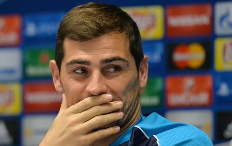 FC Porto's goalkeeper Iker Casillas attends a press conference, on the eve of the UEFA Champions league Group G football match between FC Dynamo Kiev and FC Porto at the Olimpiysky stadium in Kiev on September 15, 2015. AFP PHOTO/GENYA SAVILOV