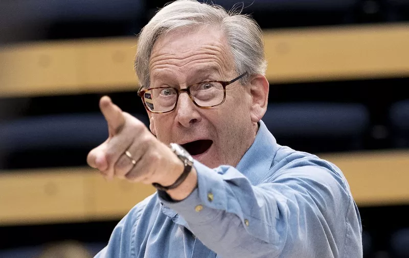 In this photograph taken on April 5, 2017, British composer Sir John Eliot Gardiner conducts the orchestra during a rehearsal session at Sadler's Wells Theatre in London. (Photo by JUSTIN TALLIS / AFP)