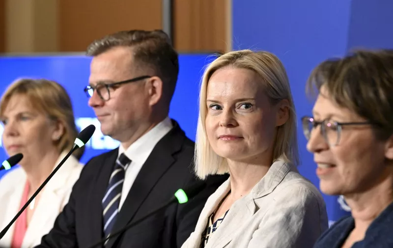 (L-R) Swedish People's Party chair Anna-Maja Henriksson, National Coalition Party chair Petteri Orpo, The Finns Party chair Riikka Purra and Christian Democrats chair Sari Essayah deliver a joint press conference in Helsinki, Finland, on June 15, 2023. Finland's conservative leader and Prime Minister designate Petteri Orpo announced on June 15, 2023, a four-party coalition including the far-right Finns Party had agreed to form a government over two months after elections. Besides the Finns Party, which secured second place in April's 2023 general election, Orpo's coalition includes the smaller Swedish People's Party (RKP) and Christian Democrats. (Photo by Heikki Saukkomaa / Lehtikuva / AFP) / Finland OUT