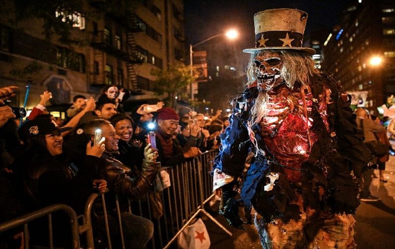 NEW YORK, NY - OCTOBER 31: Halloween revelers attend the 44th Annual Village Halloween Parade on October 31, 2017 in New York City.   Dia Dipasupil/Getty Images/AFP