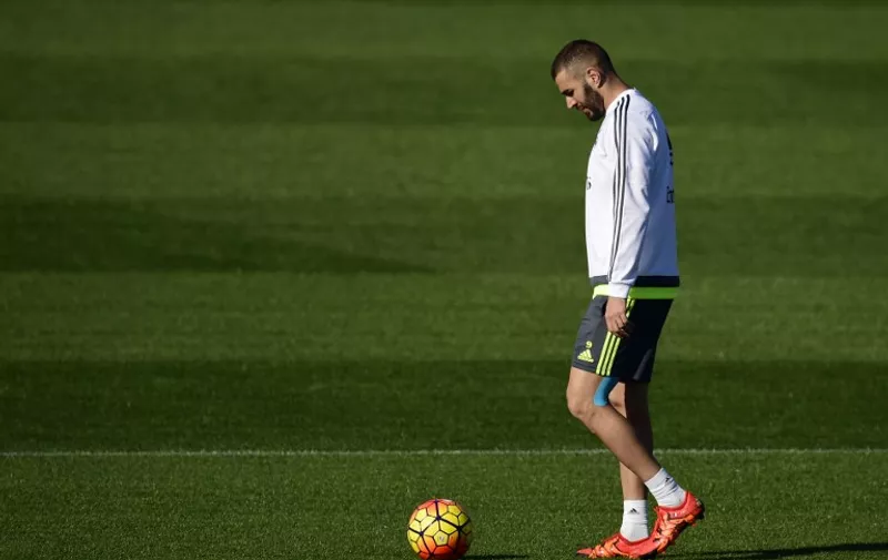 Real Madrid's French forward Karim Benzema walks during a training session at Valdebebas Sport City in Madrid on November 7, 2015 on the eve of their Liga's football match against Sevilla . AFP PHOTO/ PIERRE-PHILIPPE MARCOU