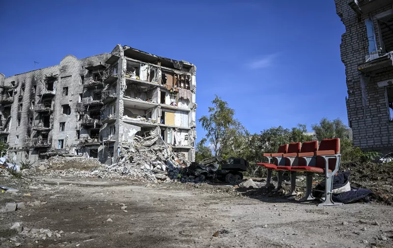 This photograph taken in Izyum, eastern Ukraine, on 29 September 2022, shows destroyed buidings, amid the Russian invasion of Ukraine. (Photo by Juan BARRETO / AFP)