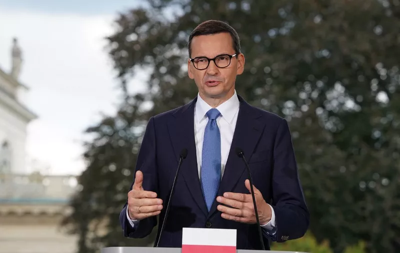 Poland's Prime Minister Mateusz Morawiecki addresses a press conference with his Spanish counterpart after their meeting in Lazienki palace in Warsaw, Poland on July 27, 2022 (Photo by JANEK SKARZYNSKI / AFP)