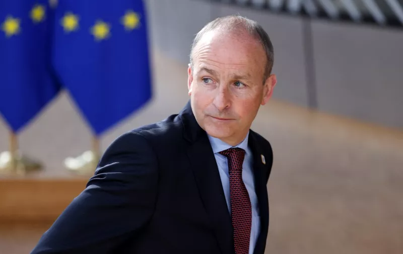 Ireland's Prime Minister Micheal Martin arrives for the second day of a European Union (EU) summit at the EU Headquarters, in Brussels on March 25, 2022. (Photo by Ludovic MARIN / AFP)