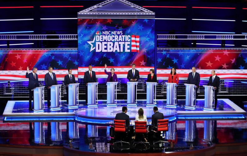 MIAMI, FLORIDA - JUNE 26: Democratic presidential candidates New York City Mayor Bill De Blasio (L-R), Rep. Tim Ryan (D-OH), former housing secretary Julian Castro, Sen. Cory Booker (D-NJ), Sen. Elizabeth Warren (D-MA), former Texas congressman Beto O'Rourke, Sen. Amy Klobuchar (D-MN), Rep. Tulsi Gabbard (D-HI), Washington Gov. Jay Inslee, and former Maryland congressman John Delaney take part in the first night of the Democratic presidential debate on June 26, 2019 in Miami, Florida.  A field of 20 Democratic presidential candidates was split into two groups of 10 for the first debate of the 2020 election, taking place over two nights at Knight Concert Hall of the Adrienne Arsht Center for the Performing Arts of Miami-Dade County, hosted by NBC News, MSNBC, and Telemundo. (Photo by Joe Raedle/Getty Images)