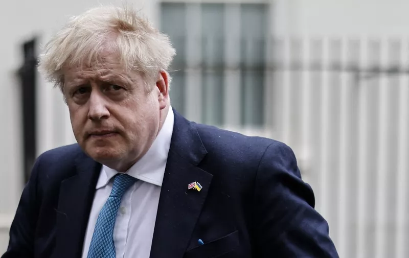 Britain's Prime Minister Boris Johnson leaves the 10 Downing Street, in London, on March 2, 2022, following a meeting with Ukraine's ambassador to Britain. (Photo by Tolga Akmen / AFP)