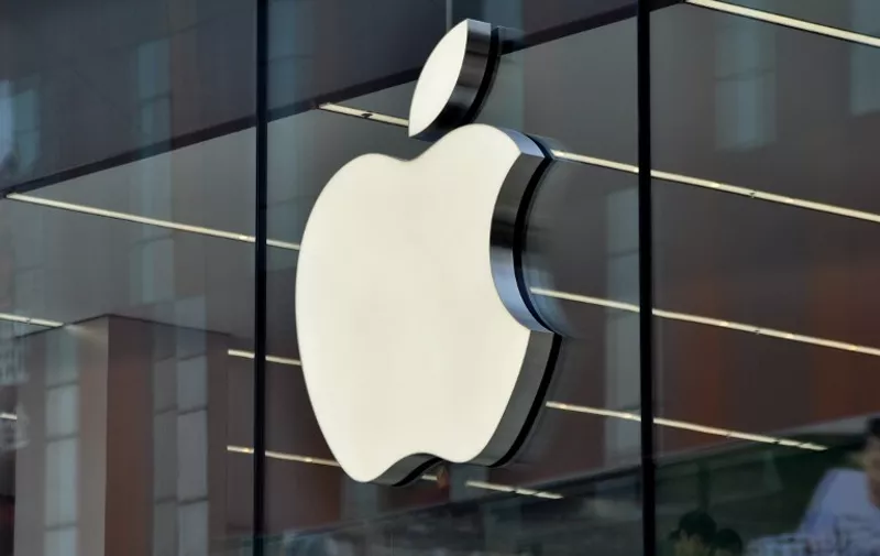 --FILE--The logo of Apple Inc. is on display on the glass facade of an Apple Store in Shenyang city, northeast China's Liaoning province, 10 May 2015.

Nasdaq OMX Group Inc. is seeking to tempt Shenzhen stock investors with Apple Inc. and Microsoft Corp. amid a rally in Chinese technology shares that's making the U.S. dot-com bubble look subdued. Nasdaq will start an exchange-traded fund in Shenzhen tracking the Nasdaq 100 Index by early in the third quarter, Robert Hughes, who manages the New York-based company's global indexes business, said in an interview on Wednesday (20 May 2015). It's licensed GF Fund Management Co. to offer the Guangfa Nasdaq-100 Index Fund, which will be Shenzhen's first ETF based on the gauge, he said. The rally that's added more than $5 trillion to the value of Chinese equities over the past year has been even more pronounced in Shenzhen, where the market is dominated by smaller technology companies.