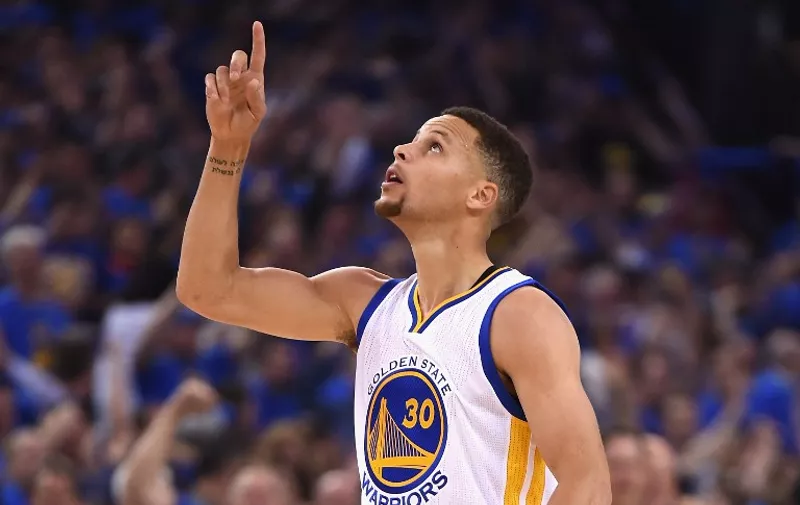 OAKLAND, CA - APRIL 13: Stephen Curry #30 of the Golden State Warriors gestures in the first half against the Memphis Grizzlies during the game at ORACLE Arena on April 13, 2016 in Oakland, California.   Thearon W. Henderson/Getty Images/AFP
