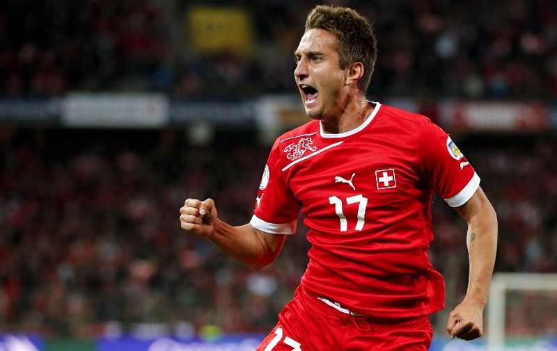 Switzerland's midfielder Marco Gavranovic reacts after scoring his team's first goal during their FIFA 2014 World Cup qualifier group E football match between Switzerland and Norway on October 12, 2012 in Bern. AFP PHOTO / FABRICE COFFRINI / AFP / FABRICE COFFRINI