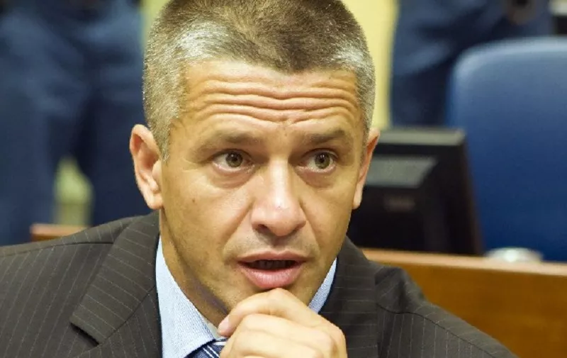 The commander of Bosnian Muslim forces in Srebrenica, Naser Oric, is pictured at the court house of the UN war crimes tribunal on July 3, 2008 in The Hague. Naser Oric was cleared today when the appeals chamber of the UN war crimes tribunal overturned his conviction for war crimes. AFP PHOTO / ANP PHOTO / POOL / ZORAN LESIC netherlands out - belgium out