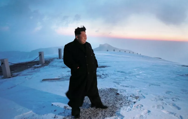 This photo taken on April 18, 2015 and released by North Korea's official Korean Central News Agency (KCNA) on April 20, 2015 shows North Korean leader Kim Jong-Un on a snow-covered Mount Paektu during sunrise in Ryanggang Province.    - - -  REPUBLIC OF KOREA OUT AFP PHOTO / KCNA via KNS
THIS PICTURE WAS MADE AVAILABLE BY A THIRD PARTY. AFP CAN NOT INDEPENDENTLY VERIFY THE AUTHENTICITY, LOCATION, DATE AND CONTENT OF THIS IMAGE. THIS PHOTO IS DISTRIBUTED EXACTLY AS RECEIVED BY AFP. ---EDITORS NOTE--- RESTRICTED TO EDITORIAL USE - MANDATORY CREDIT "AFP PHOTO/KCNA VIA KNS" - NO MARKETING NO ADVERTISING CAMPAIGNS - DISTRIBUTED AS A SERVICE TO CLIENTS