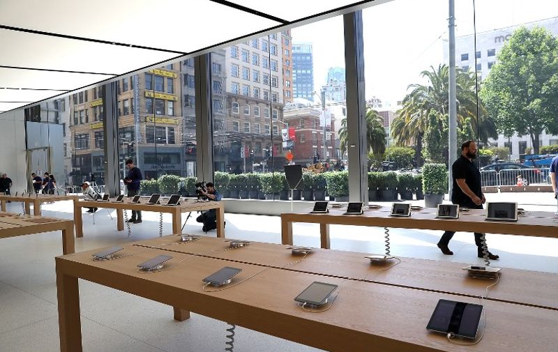SAN FRANCISCO, CA - MAY 19: A view of the new flagship Apple Store on May 19, 2016 in San Francisco, California. Apple is preparing to open its newest flagship store in San Francisco's Union Square on Saturday May 21. The new store features new design elements as well as community programs including the "genius grove" where where customers can get support under a canopy of local trees and "the plaza" a public space that will be open 24 hour a day. Visitors will enter the store through 42-foot tall sliding glass doors.   Justin Sullivan/Getty Images/AFP