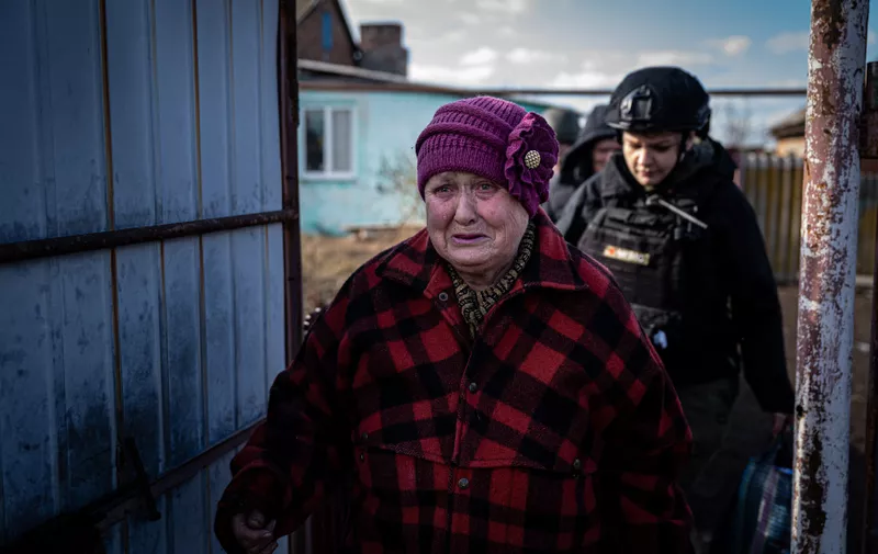 MINKIVKA, DONBASS REGION, UKRAINE, MARCH 5: A woman cries as she evacuates her house, with the help of the volunteers of the NGO Road to Relief in Minkivka, Ukraine amid Russia-Ukraine war on March 5 2023. North of Bakhmut, in the little village of Minkivka, artillery fire is often directed nearby. Ignacio Marin / Anadolu Agency/ABACAPRESS.COM,Image: 760682036, License: Rights-managed, Restrictions: , Model Release: no