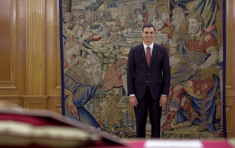Spain's new Prime Minister Pedro Sanchez smiles during a swearing-in ceremony at the Zarzuela Palace near Madrid on June 2, 2018.
Spain's Socialist chief Pedro Sanchez was sworn in as prime minister, a day after ousting Mariano Rajoy in a historic no-confidence vote sparked by fury over corruption woes afflicting the conservative leader's party. / AFP PHOTO / POOL / Emilio Naranjo