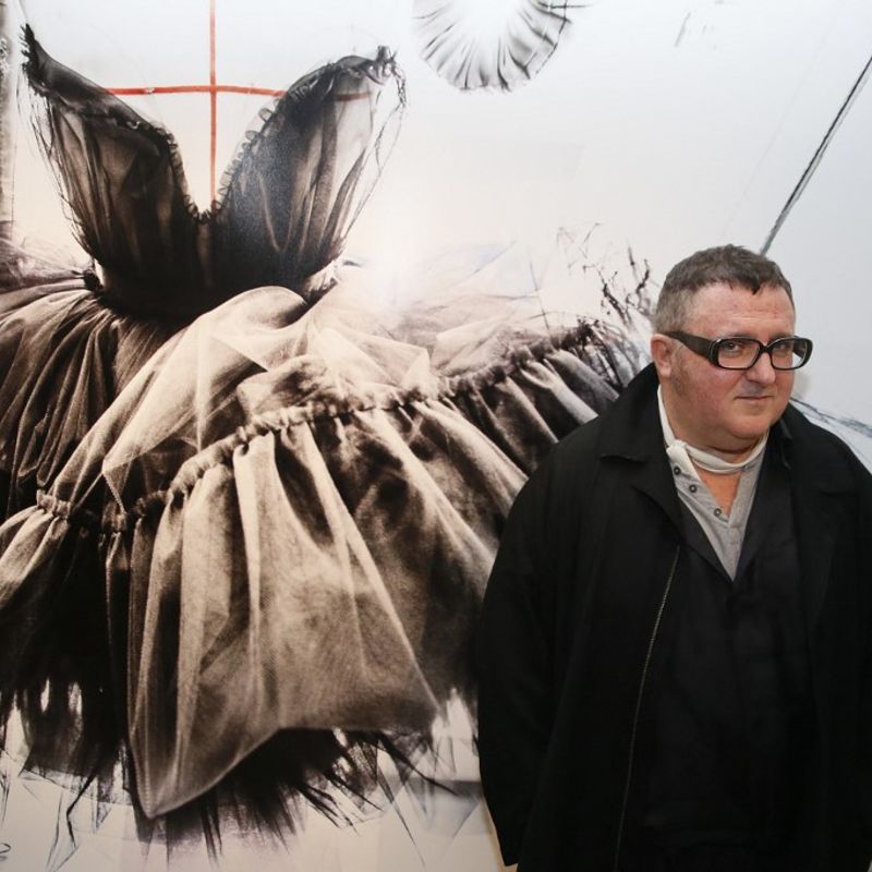 (FILES) In this file photo taken on September 08, 2015 in Paris, artistic director of the Couture house Lanvin, designer Alber Elbaz, poses during the exhibition "Manifesto" dedicated to his work. Alber Elbaz, the fashion designer whose audacious designs transformed the storied French house Lanvin into an industry darling before his shock ouster in 2015, has died aged 59, the Richemont luxury group said on April 25, 2021. (Photo by Patrick KOVARIK / AFP)
