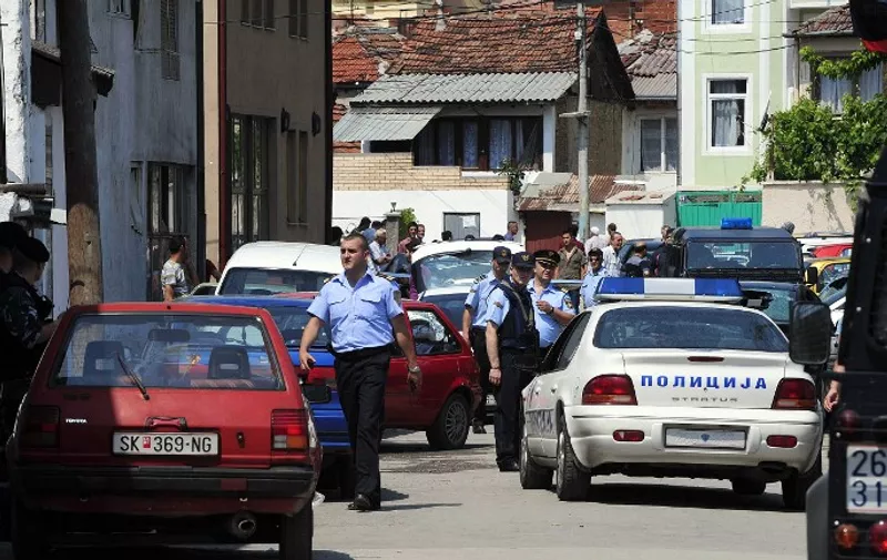 Police officers secure the site of a shooting at a polling station in a primary school in Skopje on June 1, 2008, as the country held early elections where two separate shootings left one person dead and three wounded. The State Election Commission said voting had been suspended in eight polling stations in Aracinovo. Shootings [&hellip;]
