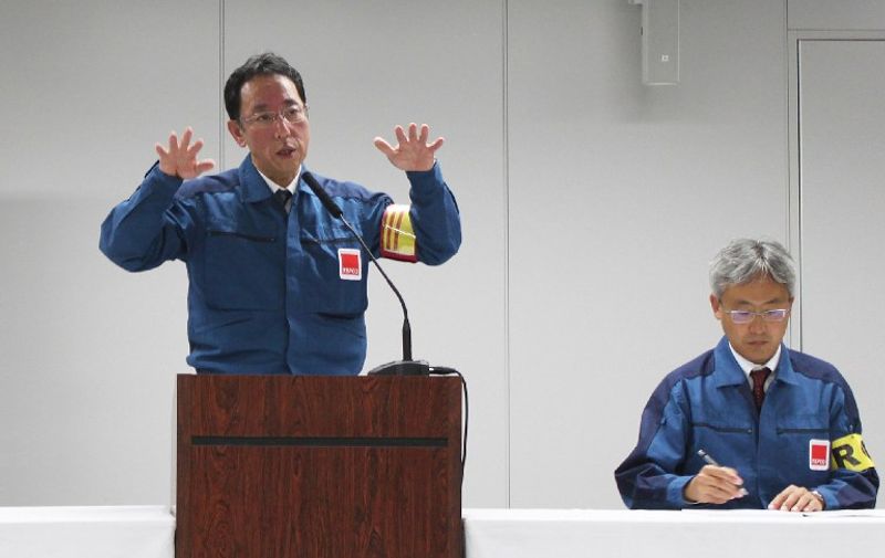 Naohiro Masuda (L), a leader of the Fukushima Daiichi Decontamination and Decommissioning Engineering Company, explains the situation on the Fukushima Daiichi nuclear power plant following this morning's earthquake that hit Fukushima prefecture, at the TEPCO headquarters in Tokyo on November 22, 2016.
A powerful 6.9-magnitude earthquake hit northeastern Japan on November 22, triggering tsunamis along the coast including a one-metre (3.3-foot) wave that crashed ashore at the stricken Fukushima nuclear power plant. / AFP PHOTO / JIJI PRESS / JIJI PRESS / Japan OUT