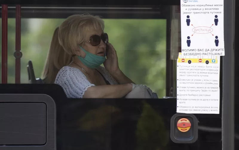 A woman with a mask and gloves on the bus during the new coronavirus lockdown.
Coronavirus outbreak, Belgrade, Serbia - 08 Jul 2020,Image: 541445197, License: Rights-managed, Restrictions: , Model Release: no
