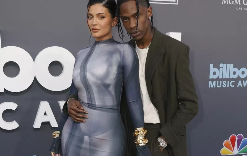 LAS VEGAS, NEVADA - MAY 15: Kylie Jenner and Travis Scott attend the 2022 Billboard Music Awards at MGM Grand Garden Arena on May 15, 2022 in Las Vegas, Nevada.   Frazer Harrison/Getty Images/AFP (Photo by Frazer Harrison / GETTY IMAGES NORTH AMERICA / Getty Images via AFP)