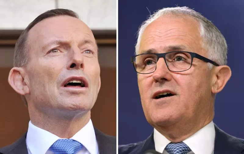 (FILES) This combo of file photos shows Australia's Communications Minister Malcolm Turnbull (R) speaking at a press conference in Sydney September 24, 2013 and Australian Prime Minister Tony Abbott (L) speaking to the media during a press conference at Parliament House in Canberra on September 9, 2015 . Turnbull on September 14, 2015 announced he would challenge Prime Minister Tony Abbott for the leadership, saying the country needed a new style of leadership after resigning as communications minister. AFP PHOTO / FILES / Greg WOOD / Mark GRAHAM