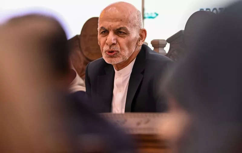 Afghanistan's President Ashraf Ghani (C) speaks during a Joint Coordination and Monitoring Board meeting (JCMB) at the Afghan presidential palace in Kabul on July 28, 2021. (Photo by SAJJAD HUSSAIN / AFP)