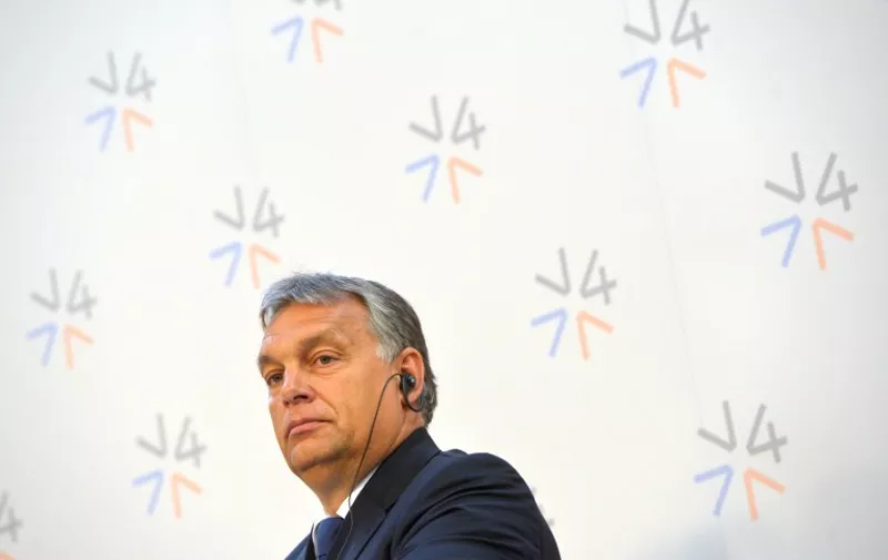 Hungary's Prime Minister Viktor Orban attends the press conference after the V4 Visegrad Group leaders emergency meeting to forge ahead a common position on tackling the migrant crisis engulfing the continent on September 04, 2015 in Prague. AFP PHOTO / MICHAL CIZEK