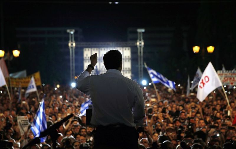 Greek Prime Minister Alexis Tsipras addresess an anti-austerity rally at the Syntagma square in Athens on July 3, 2015. Tsipras urged voters to ignore European scaremongering and vote 'No' for July 5 referendum as polls showed support swinging behind the 'Yes' campaign. AFP PHOTO / POOL / Yannis Behrakis