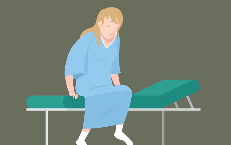 Illustration of patient in examination bed