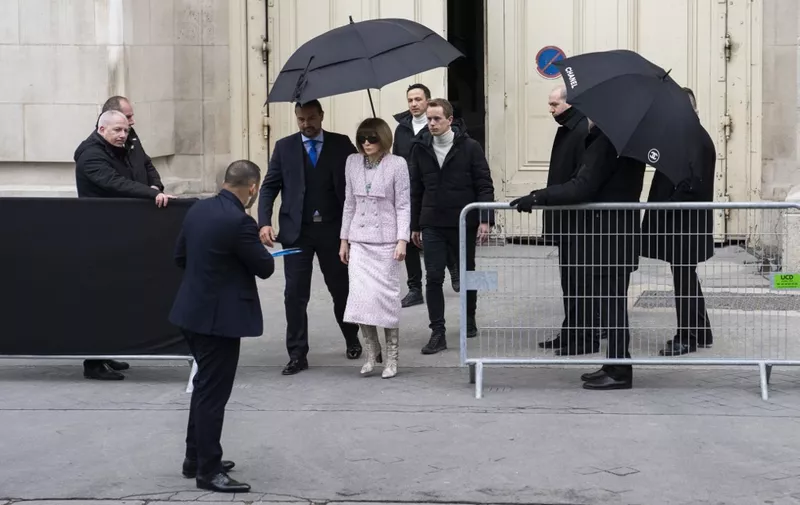 Vogue chief editor Anna Wintour (C) leaves after the Women's Fall-Winter 2019/2020 Ready-to-Wear collection fashion show by Chanel at the Grand Palais in Paris, on March 5, 2019. (Photo by - / AFP)