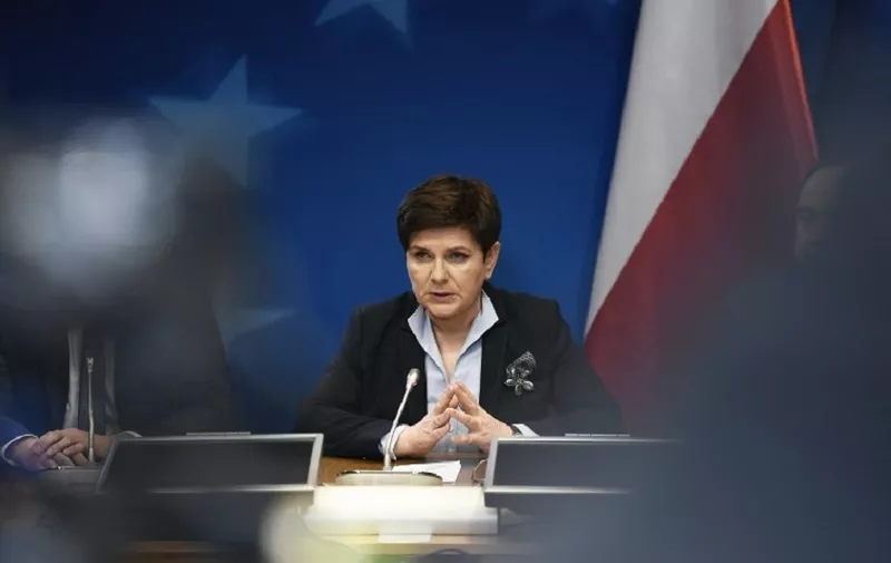 Polish Prime Minister Beata Szydlo holds a press conference on the second day of a European Union Summit at the EU headquarters in Brussels on March 10, 2017.
The bloc's leaders voted by 27 to one at the summit in Brussels on March 10 to give former Polish premier Tusk a new two-and-a-half-year mandate, with only Poland's current Prime Minister Beata Szydlo voting against. Szydlo, whose right-wing eurosceptic Law and Justice (PiS) party has nursed a long and bitter enmity with the centrist Tusk, announced that she would block the summit's final communique in revenge.
 / AFP PHOTO / STEPHANE DE SAKUTIN