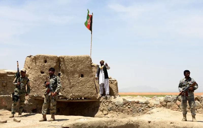 Afghan Border Police personnel keep watch during an ongoing battle between Pakistani and Afghan Border forces near the Durand line at Spin Boldak, in southern Kandahar province on May 5, 2017.


Pakistani and Afghan officials have accused each other of killing civilians after gunfire erupted near a major border crossing where Pakistani census officials were carrying out a count, exacerbating tensions between the neighbours. / AFP PHOTO / JAVED TANVEER