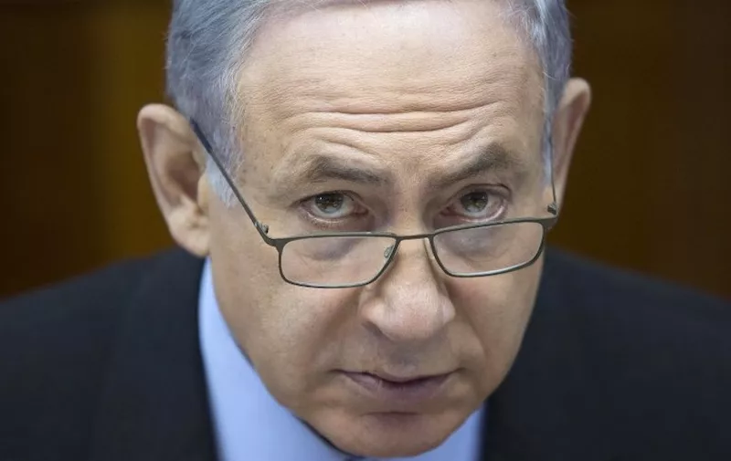 Israeli Prime Minister Benjamin Netanyahu attends the weekly cabinet meeting at his office in Jerusalem on August 16, 2015. AFP PHOTO / POOL / ABIR SULTAN
