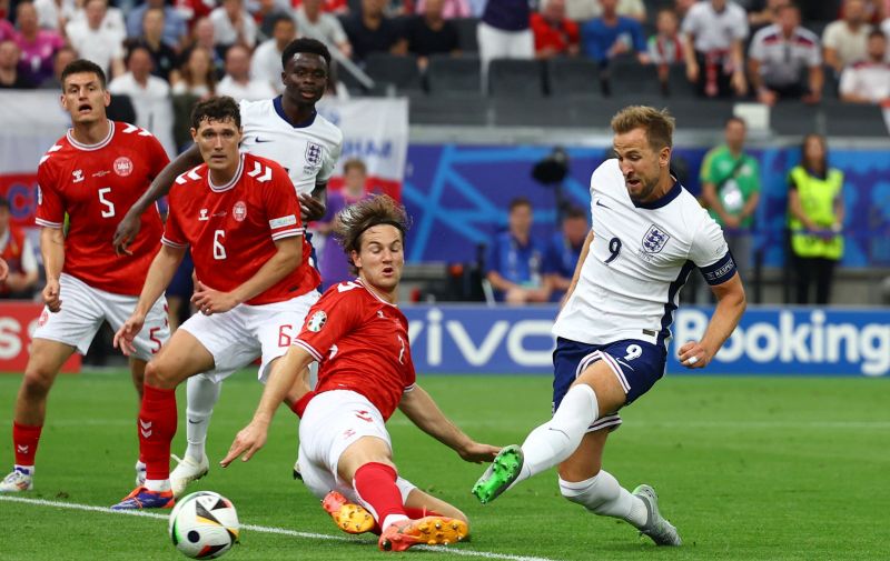 Soccer Football - Euro 2024 - Group C - Denmark v England - Frankfurt Arena, Frankfurt, Germany - June 20, 2024 England's Harry Kane scores their first goal REUTERS/Lee Smith