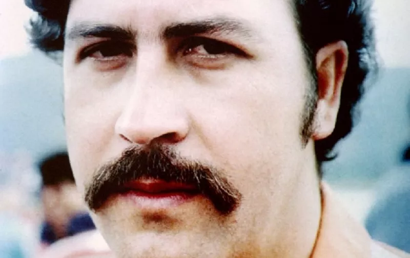 This undated file photo shows jailed Medellin drugs cartel leader Pablo Escobar who has been held at the Envigado Prison since June 19, 1991. Prison officials report that Escobar and his brother Roberto barricaded themselves in an underground tunnel in the prison late July 21 after the Colombian Justice department ordered their transfer to a military base near Medellin. (Photo by AFP)