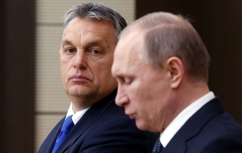 Russian President Vladimir Putin (R) and Hungarian Prime Minister Viktor Orban attend a joint press conference following their meeting at the Novo-Ogaryovo state residence outside Moscow, on February 17, 2016. AFP PHOTO / POOL / MAXIM SHIPENKOV (Photo by MAXIM SHIPENKOV / POOL / AFP)