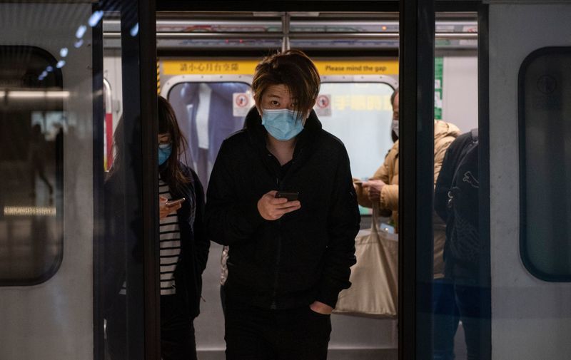 Commuters wearing face masks exit MTR subway train in Admiralty station, Hong Kong.
Coronavirus outbreak, Hong Kong, China - 04 Feb 2020
Hong Kong on February 4th became the second place outside mainland China to report the death of a coronavirus patient as officials said they feared local transmissions were increasing in the densely populated city., Image: 496439042, License: Rights-managed, Restrictions: , Model Release: no, Credit line: Miguel Candela/SOPA Images / Shutterstock Editorial / Profimedia