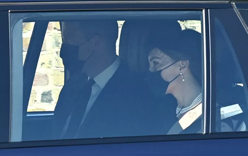 Britain's Prince William, Duke of Cambridge and Britain's Catherine, Duchess of Cambridge arrive for the funeral service of Britain's Prince Philip, Duke of Edinburgh in Windsor Castle in Windsor, west of London, on April 17, 2021. - Philip, who was married to Queen Elizabeth II for 73 years, died on April 9 aged 99 just weeks after a month-long stay in hospital for treatment to a heart condition and an infection. (Photo by Glyn KIRK / POOL / AFP)