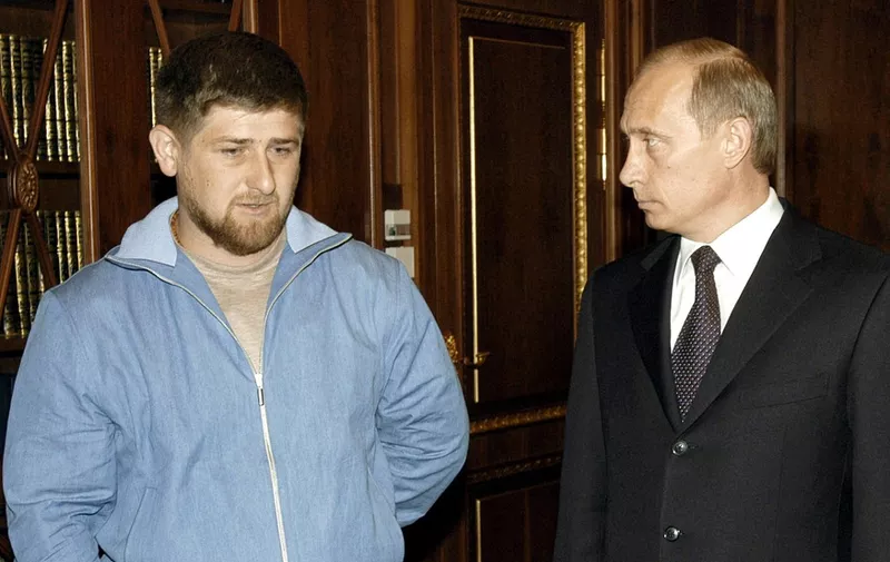 Russian President Vladimir Putin (R) talks to Ramzan Kadyrov, son and chief of the security of the killed Chechen President Akhmad Kadyrov in Moscow's Kremlin, 09 May 2004. Akhmad Kadyrov was reportedly killed in a blast that rocked a stadium in the republic's capital Grozny earlier today.   AFP PHOTO / ITAR-TASS (Photo by VLADIMIR RODIONOV / ITAR-TASS / AFP)