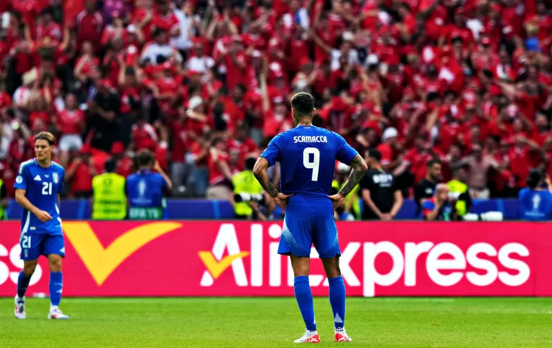 Italy's Gianluca Scamacca reacts after Switzerland's Remo Freuler scored the opening goal during a round of sixteen match between Switzerland and Italy at the Euro 2024 soccer tournament in Berlin, Germany, Saturday, June 29, 2024. (AP Photo/Antonio Calanni)