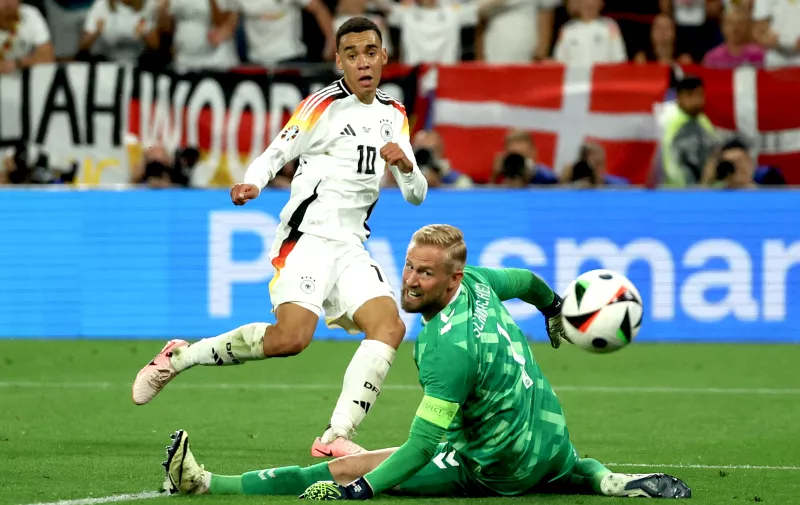 Soccer Football - Euro 2024 - Round of 16 - Germany v Denmark - Dortmund BVB Stadion, Dortmund, Germany - June 29, 2024
Germany's Jamal Musiala scores their second goal REUTERS/Thilo Schmuelgen