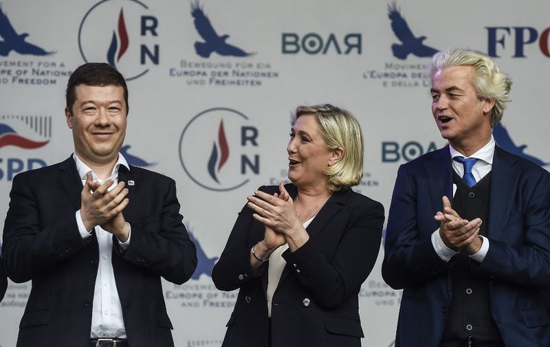 (L to R) Tomio Okamura, leader of Czech far-right Freedom and Direct Democracy party (SPD), Marine Le Pen, head of France's National Rally party and Dutch far-right politician Geert Wilders of the PVV party (Partij voor de Vrijheid) greet their fans during a conference of the rightwing Europe of Nations and Freedom (ENF) group in the European parliament, on April 25, 2019 in Prague. (Photo by Michal CIZEK / AFP)