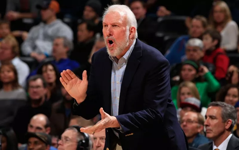 DENVER, CO - DECEMBER 14: Head coach Gregg Popovich of the San Antonio Spurs leads his team against the Denver Nuggets at Pepsi Center on December 14, 2014 in Denver, Colorado. NOTE TO USER: User expressly acknowledges and agrees that, by downloading and or using this photograph, User is consenting to the terms and conditions of the Getty Images License Agreement.   Doug Pensinger/Getty Images/AFP